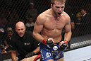 CALGARY, CANADA - JULY 21: Bryan Caraway celebrates after forcing Mitch Gagnon to tap out during their bantamweight bout at UFC 149 inside the Scotiabank Saddledome on July 21, 2012 in Calgary, Alberta, Canada.  (Photo by Nick Laham/Zuffa LLC/Zuffa LLC via Getty Images)