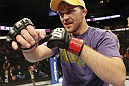 CALGARY, CANADA - JULY 21:  Bryan Caraway celebrates after defeating Mitch Gagnon during their bantamweight bout at UFC 149 inside the Scotiabank Saddledome on July 21, 2012 in Calgary, Alberta, Canada.  (Photo by Nick Laham/Zuffa LLC/Zuffa LLC via Getty Images)