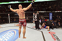 CALGARY, CANADA - JULY 21:  Ryan Jimmo knocks out Anthony Perosh in six seconds during their light heavyweight bout at UFC 149 inside the Scotiabank Saddledome on July 21, 2012 in Calgary, Alberta, Canada.  (Photo by Nick Laham/Zuffa LLC/Zuffa LLC via Getty Images)