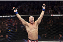 CALGARY, CANADA - JULY 21:  Ryan Jimmo celebrates after defeating Anthony Perosh by knockout in six seconds during round one of their light heavyweight bout at UFC 149 inside the Scotiabank Saddledome on July 21, 2012 in Calgary, Alberta, Canada.  (Photo by Nick Laham/Zuffa LLC/Zuffa LLC via Getty Images)