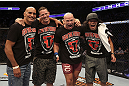CALGARY, CANADA - JULY 21: Ryan Jimmo (second from right) celebrates with his corner after defeating Anthony Perosh during their light heavyweight bout at UFC 149 inside the Scotiabank Saddledome on July 21, 2012 in Calgary, Alberta, Canada.  (Photo by Nick Laham/Zuffa LLC/Zuffa LLC via Getty Images)