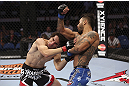CALGARY, CANADA - JULY 21:  (R-L) Francisco Rivera lands a punch to the head of Roland Delorme during their bantamweight bout at UFC 149 inside the Scotiabank Saddledome on July 21, 2012 in Calgary, Alberta, Canada.  (Photo by Nick Laham/Zuffa LLC/Zuffa LLC via Getty Images)