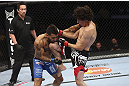 CALGARY, CANADA - JULY 21: (R-L) Roland Delorme lands a knee to the chin of Francisco Rivera during their bantamweight bout at UFC 149 inside the Scotiabank Saddledome on July 21, 2012 in Calgary, Alberta, Canada.  (Photo by Nick Laham/Zuffa LLC/Zuffa LLC via Getty Images)