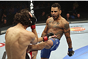 CALGARY, CANADA - JULY 21: (R-L) Francisco Rivera lands a kick to Roland Delorme during their bantamweight bout at UFC 149 inside the Scotiabank Saddledome on July 21, 2012 in Calgary, Alberta, Canada.  (Photo by Nick Laham/Zuffa LLC/Zuffa LLC via Getty Images)