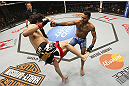 CALGARY, CANADA - JULY 21:  (R-L) Francisco Rivera lands a punch to the head of Roland Delorme during their bantamweight bout at UFC 149 inside the Scotiabank Saddledome on July 21, 2012 in Calgary, Alberta, Canada.  (Photo by Nick Laham/Zuffa LLC/Zuffa LLC via Getty Images)