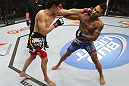 CALGARY, CANADA - JULY 21:  (R-L) Francisco Rivera lands a punch to the head of Roland Delorme during their bantamweight bout at UFC 149 inside the Scotiabank Saddledome on July 21, 2012 in Calgary, Alberta, Canada.  (Photo by Nick Laham/Zuffa LLC/Zuffa LLC via Getty Images)