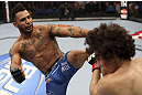 CALGARY, CANADA - JULY 21: (L-R) Francisco Rivera lands a kick to the head of Roland Delorme during their bantamweight bout at UFC 149 inside the Scotiabank Saddledome on July 21, 2012 in Calgary, Alberta, Canada.  (Photo by Nick Laham/Zuffa LLC/Zuffa LLC via Getty Images)