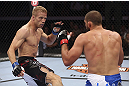 CALGARY, CANADA - JULY 21: (L-R) Nick Ring looks to strike against Court McGee during their middleweight bout at UFC 149 inside the Scotiabank Saddledome on July 21, 2012 in Calgary, Alberta, Canada.  (Photo by Nick Laham/Zuffa LLC/Zuffa LLC via Getty Images)