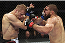 CALGARY, CANADA - JULY 21:  (L-R) Nick Ring exchanges strikes with Court McGee during their middleweight bout at UFC 149 inside the Scotiabank Saddledome on July 21, 2012 in Calgary, Alberta, Canada.  (Photo by Nick Laham/Zuffa LLC/Zuffa LLC via Getty Images)