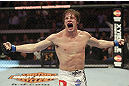 CALGARY, CANADA- JULY 21: Matthew Riddle celebrates after defeating Chris Clements during their welterweight bout at UFC 149 inside the Scotiabank Saddledome on July 21, 2012 in Calgary, Alberta, Canada.  (Photo by Nick Laham/Zuffa LLC/Zuffa LLC via Getty Images)