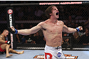 CALGARY, CANADA- JULY 21: Matthew Riddle celebrates after defeating Chris Clements during their welterweight bout at UFC 149 inside the Scotiabank Saddledome on July 21, 2012 in Calgary, Alberta, Canada.  (Photo by Nick Laham/Zuffa LLC/Zuffa LLC via Getty Images)