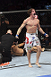 CALGARY, CANADA- JULY 21: Matthew Riddle celebrates after defeating Chris Clements during their welterweight bout at UFC 149 inside the Scotiabank Saddledome on July 21, 2012 in Calgary, Alberta, Canada.  (Photo by Nick Laham/Zuffa LLC/Zuffa LLC via Getty Images)