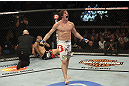 CALGARY, CANADA- JULY 21: Matthew Riddle celebrates after defeating Chris Clements during their welterweight bout at UFC 149 inside the Scotiabank Saddledome on July 21, 2012 in Calgary, Alberta, Canada.  (Photo by Nick Laham/Zuffa LLC/Zuffa LLC via Getty Images)