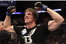CALGARY, CANADA- JULY 21: Matthew Riddle celebrates after defeating Chris Clements during their welterweight bout at UFC 149 inside the Scotiabank Saddledome on July 21, 2012 in Calgary, Alberta, Canada.  (Photo by Nick Laham/Zuffa LLC/Zuffa LLC via Getty Images)