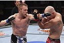 CALGARY, CANADA - JULY 21: (L-R) James Head throws a punch at Brian Ebersole during their welterweight bout at UFC 149 inside the Scotiabank Saddledome on July 21, 2012 in Calgary, Alberta, Canada.  (Photo by Nick Laham/Zuffa LLC/Zuffa LLC via Getty Images)