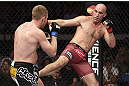 CALGARY, CANADA - JULY 21: (R-L) Brian Ebersole kicks James Head during their welterweight bout at UFC 149 inside the Scotiabank Saddledome on July 21, 2012 in Calgary, Alberta, Canada.  (Photo by Nick Laham/Zuffa LLC/Zuffa LLC via Getty Images)