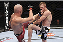 CALGARY, CANADA - JULY 21: (L-R) Brian Ebersole lands a kick to the body of James Head during their welterweight bout at UFC 149 inside the Scotiabank Saddledome on July 21, 2012 in Calgary, Alberta, Canada.  (Photo by Nick Laham/Zuffa LLC/Zuffa LLC via Getty Images)