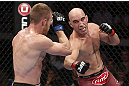 CALGARY, CANADA - JULY 21: (R-L) Brian Ebersole throws a punch at James Head during their welterweight bout at UFC 149 inside the Scotiabank Saddledome on July 21, 2012 in Calgary, Alberta, Canada.  (Photo by Nick Laham/Zuffa LLC/Zuffa LLC via Getty Images)