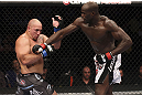 CALGARY, CANADA - JULY 21: (R-L) Cheick Kongo lands a punch to the chest of Shawn Jordan during their heavyweight bout at UFC 149 inside the Scotiabank Saddledome on July 21, 2012 in Calgary, Alberta, Canada.  (Photo by Nick Laham/Zuffa LLC/Zuffa LLC via Getty Images)