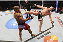 CALGARY, CANADA - JULY 21:  (L-R) Hector Lombard exchanges punches with Tim Boetsch during their middleweight bout at UFC 149 inside the Scotiabank Saddledome on July 21, 2012 in Calgary, Alberta, Canada.  (Photo by Nick Laham/Zuffa LLC/Zuffa LLC via Getty Images)