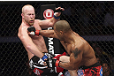CALGARY, CANADA - JULY 21: (R-L) Hector Lombard lands a punch to the face of Tim Boetsch during their middleweight bout at UFC 149 inside the Scotiabank Saddledome on July 21, 2012 in Calgary, Alberta, Canada.  (Photo by Nick Laham/Zuffa LLC/Zuffa LLC via Getty Images)