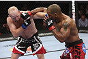 CALGARY, CANADA - JULY 21: (R-L) Hector Lombard throws a punch at Tim Boetsch during their middleweight bout at UFC 149 inside the Scotiabank Saddledome on July 21, 2012 in Calgary, Alberta, Canada.  (Photo by Nick Laham/Zuffa LLC/Zuffa LLC via Getty Images)