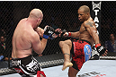 CALGARY, CANADA - JULY 21: (R-L) Hector Lombard kicks at Tim Boetsch during their middleweight bout at UFC 149 inside the Scotiabank Saddledome on July 21, 2012 in Calgary, Alberta, Canada.  (Photo by Nick Laham/Zuffa LLC/Zuffa LLC via Getty Images)