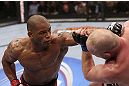 CALGARY, CANADA - JULY 21: (L-R) Hector Lombard throws a punch at Tim Boetsch during their middleweight bout at UFC 149 inside the Scotiabank Saddledome on July 21, 2012 in Calgary, Alberta, Canada.  (Photo by Nick Laham/Zuffa LLC/Zuffa LLC via Getty Images)