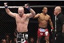 CALGARY, CANADA - JULY 21: (L-R) Tim Boetsch celebrates after three rounds fighting against Hector Lombard during their middleweight bout at UFC 149 inside the Scotiabank Saddledome on July 21, 2012 in Calgary, Alberta, Canada.  (Photo by Nick Laham/Zuffa LLC/Zuffa LLC via Getty Images)