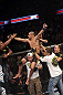 CALGARY, CANADA - JULY 21:  Renan Barao celebrates with his team after his victory over Urijah Faber after their UFC interim bantamweight championship bout at UFC 149 inside the Scotiabank Saddledome on July 21, 2012 in Calgary, Alberta, Canada.  (Photo by Nick Laham/Zuffa LLC/Zuffa LLC via Getty Images)