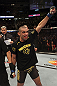 CALGARY, CANADA - JULY 21:  Renan Barao celebrates his victory over Urijah Faber during their UFC interim bantamweight championship bout at UFC 149 inside the Scotiabank Saddledome on July 21, 2012 in Calgary, Alberta, Canada.  (Photo by Nick Laham/Zuffa LLC/Zuffa LLC via Getty Images)
