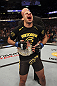 CALGARY, CANADA - JULY 21:  Renan Barao celebrates his victory over Urijah Faber during their UFC interim bantamweight championship bout at UFC 149 inside the Scotiabank Saddledome on July 21, 2012 in Calgary, Alberta, Canada.  (Photo by Nick Laham/Zuffa LLC/Zuffa LLC via Getty Images)