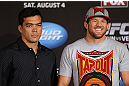LOS ANGELES - AUGUST 02: (L-R) Opponents Lyoto Machida and Ryan Bader pose for photos during the UFC on FOX press conference at the J.W. Marriott on August 2, 2012 in Los Angeles, California. (Photo by Josh Hedges/Zuffa LLC/Zuffa LLC via Getty Images)