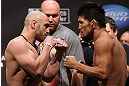 LOS ANGELES - AUGUST 03: (L-R) Opponents Manny Gamburyan and Michihiro Omigawa face off during the UFC on FOX weigh in at Staples Center on August 3, 2012 in Los Angeles, California. (Photo by Josh Hedges/Zuffa LLC/Zuffa LLC via Getty Images)