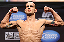 LOS ANGELES - AUGUST 03: Cole Miller makes weight during the UFC on FOX weigh in at Staples Center on August 3, 2012 in Los Angeles, California. (Photo by Josh Hedges/Zuffa LLC/Zuffa LLC via Getty Images)
