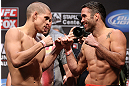 LOS ANGELES - AUGUST 03: (L-R) Joe Lauzon and Jamie Varner face off during the UFC on FOX weigh in at Staples Center on August 3, 2012 in Los Angeles, California. (Photo by Josh Hedges/Zuffa LLC/Zuffa LLC via Getty Images)