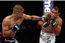LOS ANGELES, CA - AUGUST 04:  Ulysses Gomez (R) exchanges punches with John Moraga (L) in the first round during the UFC on FOX event at Staples Center on August 4, 2012 in Los Angeles, California.  (Photo by Josh Hedges/Zuffa LLC via Getty Images)