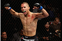 LOS ANGELES, CA - AUGUST 04:  John Moraga celebrates after knocking out Ulysses Gomez in the first round during the UFC on FOX event at Staples Center on August 4, 2012 in Los Angeles, California.  (Photo by Josh Hedges/Zuffa LLC via Getty Images)