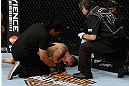 LOS ANGELES, CA - AUGUST 04:  Ulysses Gomez is tended to after John Moraga knocked him out in the first round during the UFC on FOX event at Staples Center on August 4, 2012 in Los Angeles, California.  (Photo by Josh Hedges/Zuffa LLC via Getty Images)