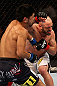 LOS ANGELES, CA - AUGUST 04:  Manny Gamburyan exchanges strikes with Michihiro Omigawa during their Featherweight bout at the UFC on FOX event at Staples Center on August 4, 2012 in Los Angeles, California.  (Photo by Josh Hedges/Zuffa LLC via Getty Images)