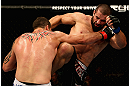 LOS ANGELES, CA - AUGUST 04:  Oli Thompson (R) kicks Phil De Fries (L) during the UFC on FOX at Staples Center on August 4, 2012 in Los Angeles, California.  (Photo by Josh Hedges/Zuffa LLC via Getty Images)