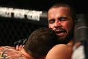 LOS ANGELES, CA - AUGUST 04:  Oli Thompson gets pinned by Phil De Fries during the UFC on FOX at Staples Center on August 4, 2012 in Los Angeles, California.  (Photo by Josh Hedges/Zuffa LLC via Getty Images)