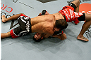 LOS ANGELES, CA - AUGUST 04:  Rani Yahya (L) holds Josh Grispi in a north/south choke prior to Grispi tapping out during the UFC on FOX event at Staples Center on August 4, 2012 in Los Angeles, California.  (Photo by Josh Hedges/Zuffa LLC via Getty Images)