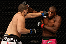 LOS ANGELES, CA - AUGUST 04:  Wagner Prado (L) and Phil Davis (R) exchange strikes during the UFC on FOX at Staples Center on August 4, 2012 in Los Angeles, California. The bout was ruled no decision due to the unintentional eye poke.  (Photo by Josh Hedges/Zuffa LLC via Getty Images)