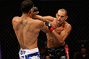 LOS ANGELES, CA - AUGUST 04:  Mike Swick (R) lands a punch on Damarques Johnson in the first round of their welterweight bout during UFC on FOX at Staples Center on August 4, 2012 in Los Angeles, California.  (Photo by Josh Hedges/Zuffa LLC via Getty Images)