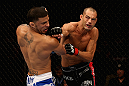 LOS ANGELES, CA - AUGUST 04:  Mike Swick (R) lands a punch on Damarques Johnson in the first round of their welterweight bout during UFC on FOX at Staples Center on August 4, 2012 in Los Angeles, California.  (Photo by Josh Hedges/Zuffa LLC via Getty Images)