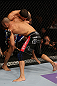 LOS ANGELES, CA - AUGUST 04:  Mike Swick pins Damarques Johnson against the cage during the UFC on FOX at Staples Center on August 4, 2012 in Los Angeles, California.  (Photo by Josh Hedges/Zuffa LLC via Getty Images)