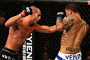LOS ANGELES, CA - AUGUST 04:  Mike Swick (L) lands a punch on Damarques Johnson in the first round of their welterweight bout during UFC on FOX at Staples Center on August 4, 2012 in Los Angeles, California.  (Photo by Josh Hedges/Zuffa LLC via Getty Images)
