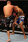 LOS ANGELES, CA - AUGUST 04:  Mike Swickthrows a knee to Damarques Johnson in the second round of their welterweight bout during UFC on FOX at Staples Center on August 4, 2012 in Los Angeles, California.  Swick won the bout by way of TKO in the second round.  (Photo by Josh Hedges/Zuffa LLC via Getty Images)