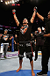 LOS ANGELES, CA - AUGUST 04:  Mike Swick celebrates after defeating Damarques Johnson by way of TKO in the second round during the UFC on FOX at Staples Center on August 4, 2012 in Los Angeles, California.  (Photo by Josh Hedges/Zuffa LLC via Getty Images)